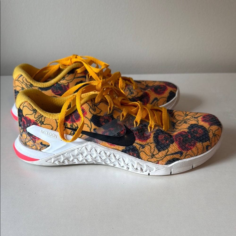 Nike Yellow and Black Athletic Shoes with Bold Design